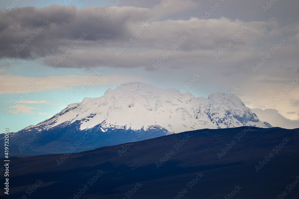 clouds over the mountains, vulcano Cotopaxi clouds over the mountains, vulcano Cotopaxi