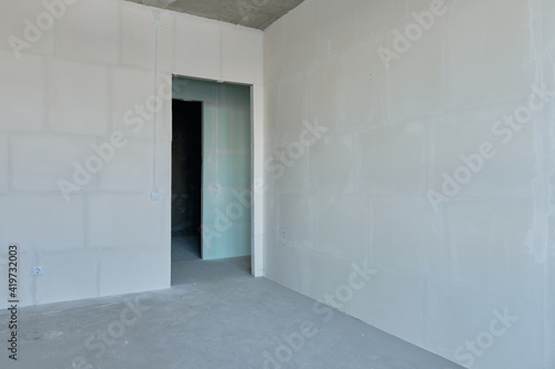Typical rough finishing of an apartment in a new building. Real estate object