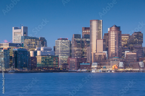 USA, Massachusetts, Boston. City skyline from Boston Harbor at dawn. © Danita Delimont