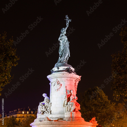 France, Ile-de-France, Paris, Monument a laÔøΩRepubliqueÔøΩat PlaceÔøΩdeÔøΩlaÔøΩRepubliqueÔøΩsquare at night photo