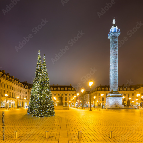 France, Ile-de-France, Paris, Christmas trees at illuminated PlaceÔøΩVendome during night photo