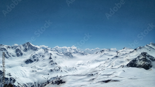 Scenic View Of Snowcapped Mountains Against Sky © Anton R.