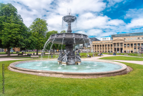Germany, Baden-Wurttemberg, Stuttgart, Ornate fountain at Schlossplatz square with Konigsbau in background