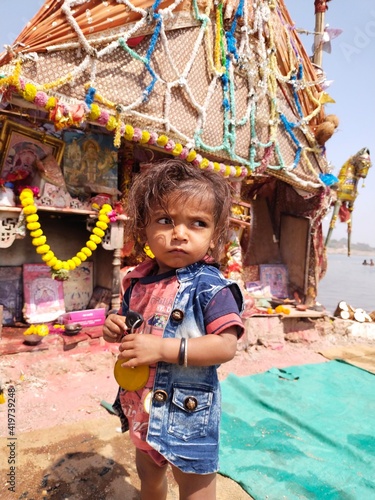 child playing in a carousel