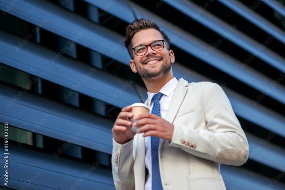 Businessman standing outside