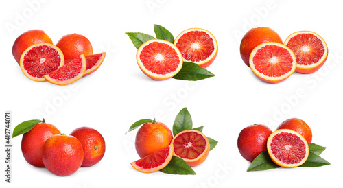 Fototapeta Naklejka Na Ścianę i Meble -  Set with ripe red oranges on white background. Banner design