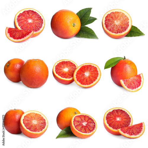 Set with ripe red oranges on white background