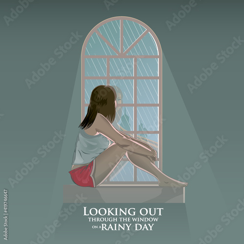 Girl looking out on Rainy Day