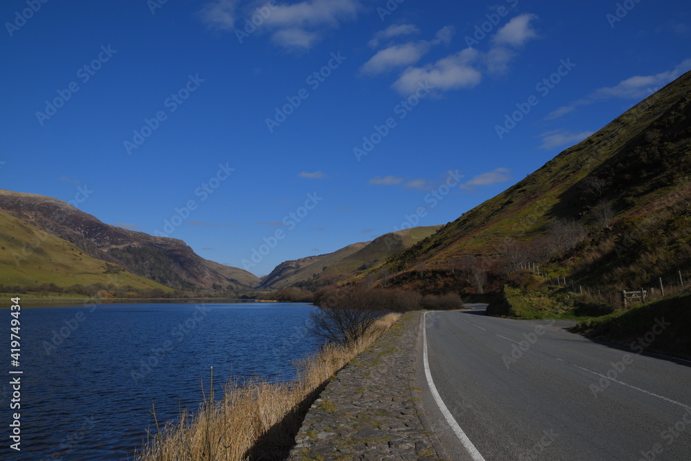 a view of tal-y-llyn lake looking over to the valley in the background a view of tal-y-llyn lake looking over to the valley in the background