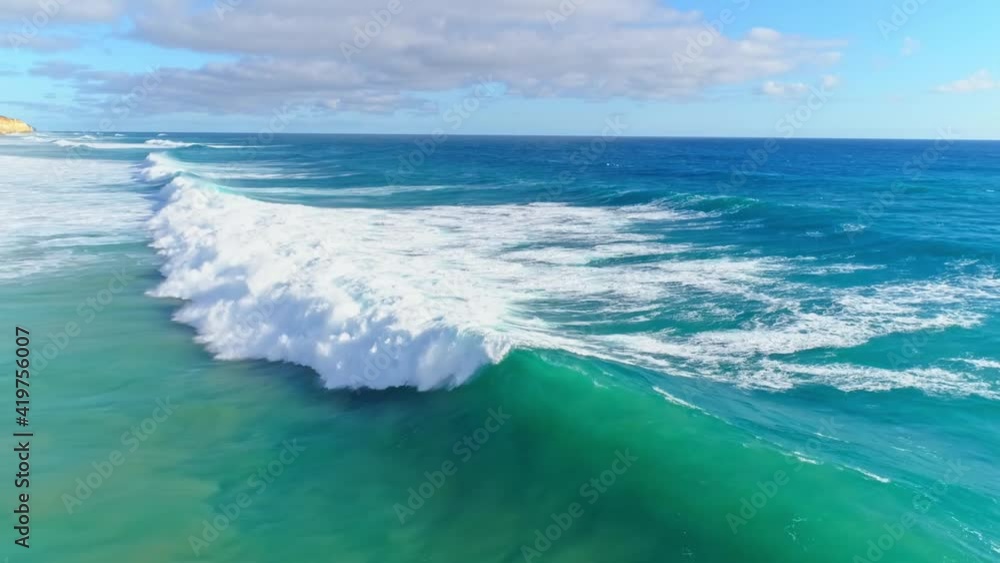 Huge waves on endless sea rushing to coast turbulently, forming a nice scenery Huge waves on endless sea rushing to coast turbulently, forming a nice scenery