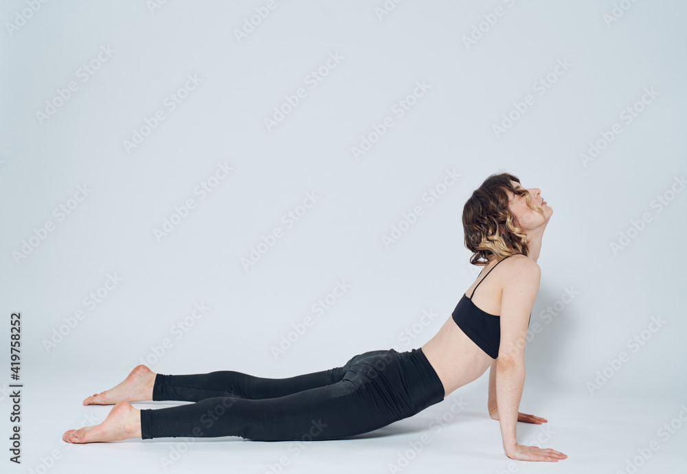 Women doing push-ups In a light room, sports meditation yoga asanas
