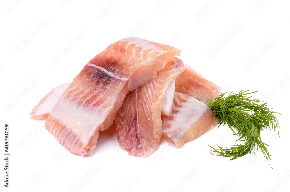 Pangasius fish fillet, pieces on a green lettuce leaf. Isolated on a white background. Fresh Fish Fillet. Pangasius fish fillet, pieces on a green lettuce leaf. Isolated on a white background. Fresh Fish Fillet.