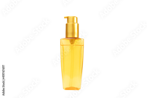 orange bottle with hair oil isolate