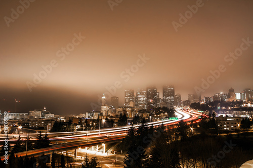 light trails from traffic in a foggy night in Seattle area