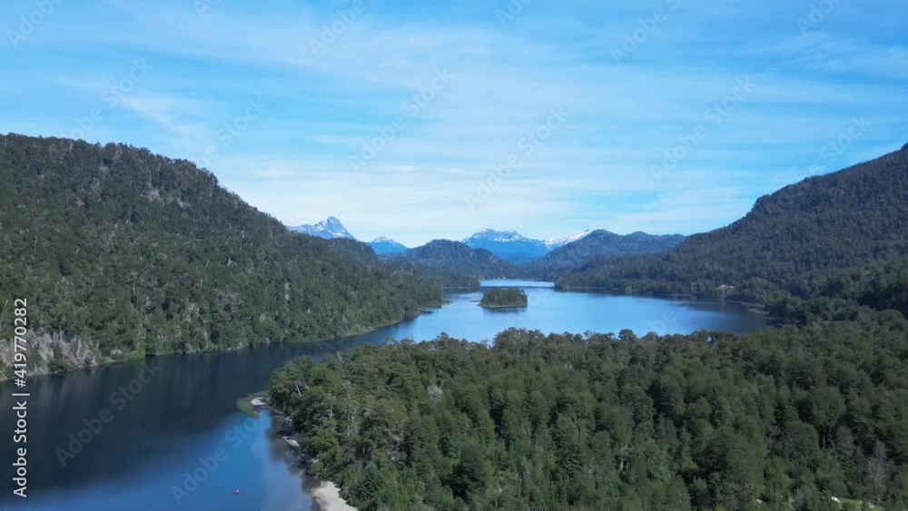 Emerging nder the woods of the Correntoso lake, in Neuquen, Patagonia Argentina. Drone footage Emerging nder the woods of the Correntoso lake, in Neuquen, Patagonia Argentina. Drone footage