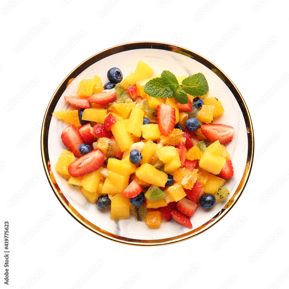 Plate with tropical fruit salad on white background Plate with tropical fruit salad on white background