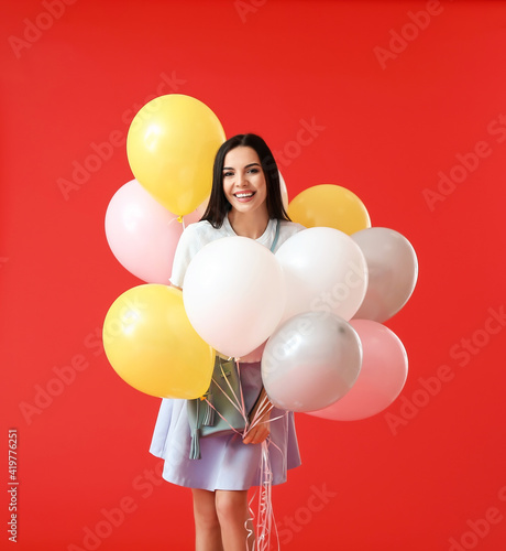 Beautiful young woman with ...