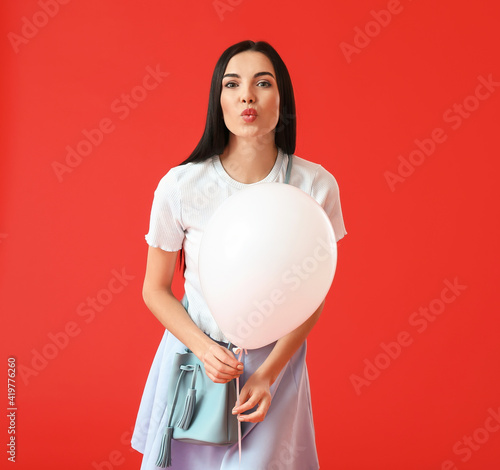 Beautiful young woman with ...