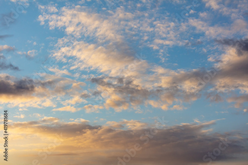 Rain clouds in the sky at sunset