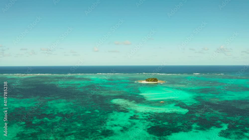 Aerial view of sandy beach with tourists on tropical island with palm trees and turquoise water. Guyam island, Philippines, Siargao. Summer and travel vacation concept Aerial view of sandy beach with tourists on tropical island with palm trees and turquoise water. Guyam island, Philippines, Siargao. Summer and travel vacation concept