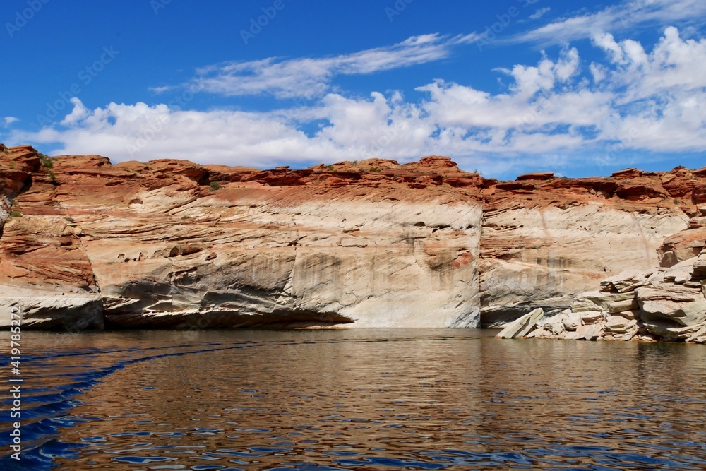 View of narrow cliff canyon from a boat in Glen Canyon National Recreation Area, Lake Powell, Arizona