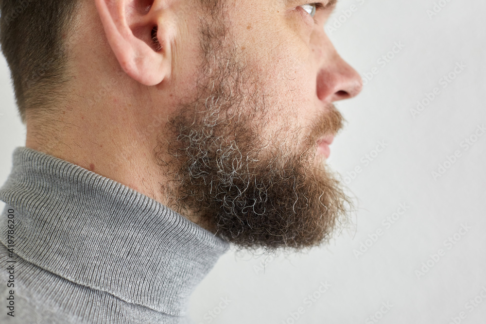 Obraz premium male short beard, portrait of a middle-aged man, side view