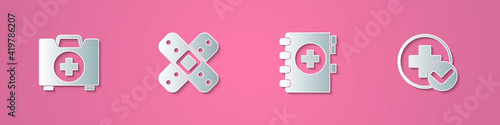 Set paper cut First aid kit, Crossed bandage plaster, Medical clipboard and hospital medical icon. Paper art style. Vector.