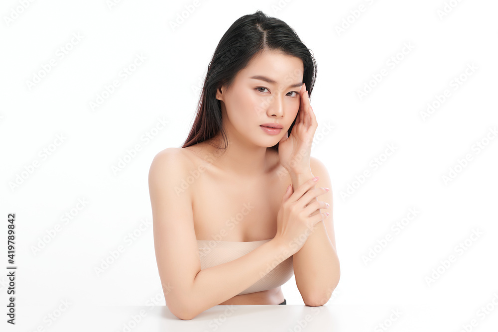 Beautiful young asian woman with clean fresh skin on white background, Face care, Facial treatment, Cosmetology, beauty and spa, Asian women portrait Beautiful young asian woman with clean fresh skin on white background, Face care, Facial treatment, Cosmetology, beauty and spa, Asian women portrait
