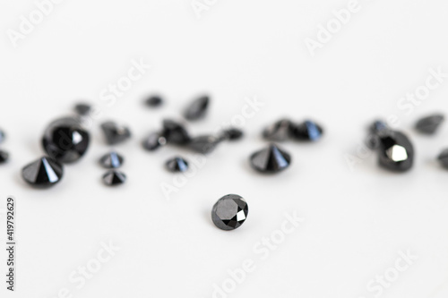 Treated Black Diamonds,. Brilliant Cut Gemstones. Faceted