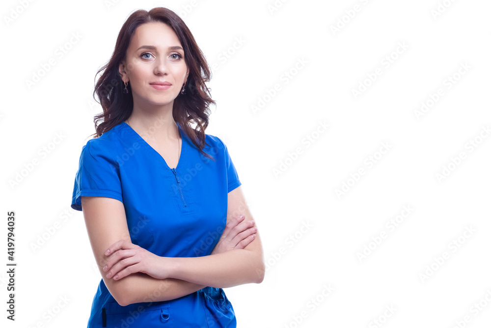 Positive Professional Female GP Doctor Posing in Blue Doctor's Smock On White Background. Positive Professional Female GP Doctor Posing in Blue Doctor's Smock On White Background.