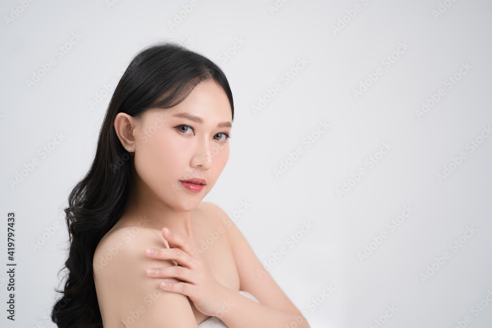 Bright facial skin of a beautiful Asian woman. Bright facial skin of a beautiful Asian woman.
