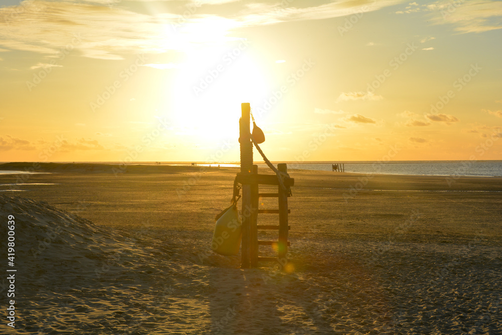Rescue equipment at sunset on Renesse beach, Netherlands