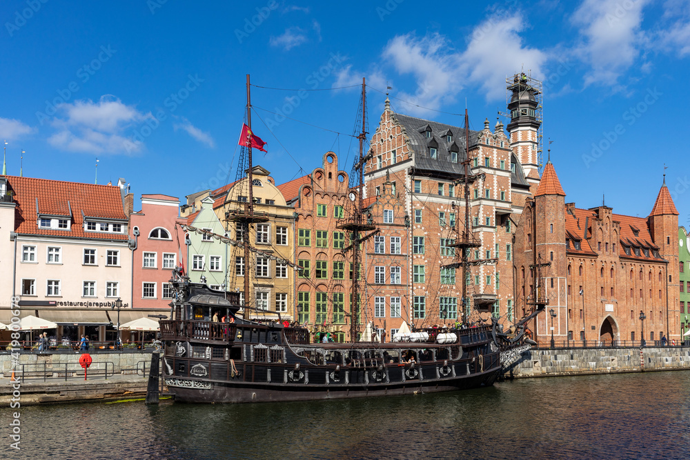  Passenger harbor on the Motława River - a replica of a galleon as a cruise ship at Dlugie Pobrzeze in old town of Gdansk