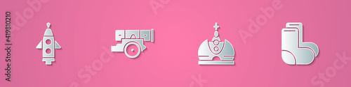 Set paper cut Rocket ship, Cannon, King crown and Valenki icon. Paper art style. Vector.