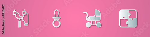 Set paper cut Slingshot, Baby dummy pacifier, stroller and Puzzle pieces toy icon. Paper art style. Vector.