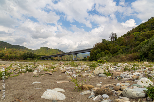 under the bridge over the Shakhe River in the Krasnodar Territory of the Sochi District, the village of Golovinka photo