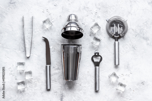 Set of bartender tools and accessories with a cocktail shaker