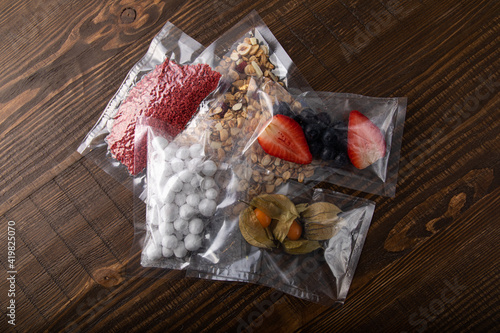 Dried nuts and berries in vacuum sealed plastic bags for easy storage