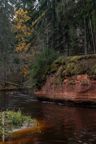 Stuku (Stūķu) Rock by the Amata river during cloudy autumn day in Latvia