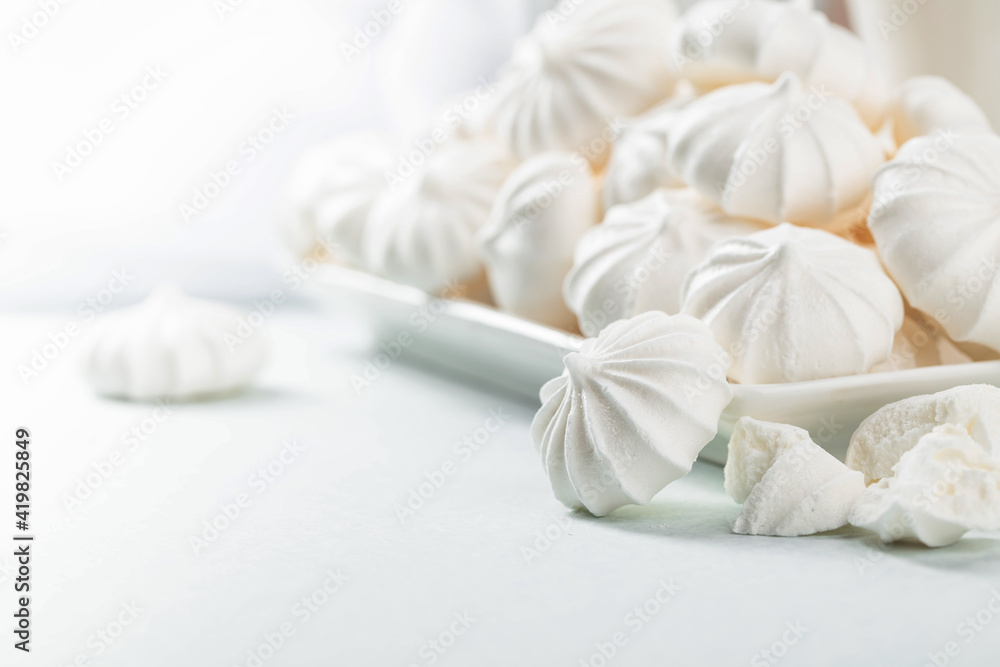 Small white meringues. Small white meringues.