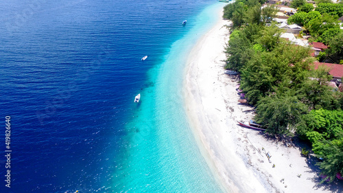 Aerial Gili Trawangan with turquoise water  Tropical island with white sandy beach and blue transparent water