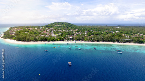 Aerial Gili Trawangan with turquoise water, Tropical island with white sandy beach and blue transparent water © Ara Creative