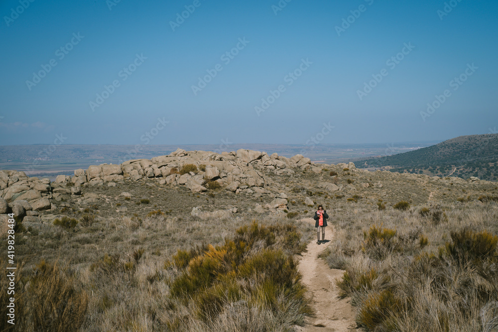 Female on a hiking trail in Mironcillo, Avila, Spain