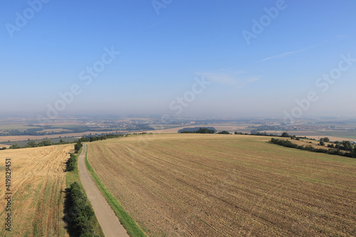 extensive field of fertile land near the city of Brno in the south of Moravia in the Czech Republic. Panorama of a cereal field on a sunny day. repelling famine.