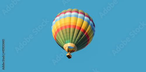 hot air balloons in a blue sky.