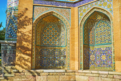 The arched niches of Sepahsalar mosque in Tehran, Iran photo