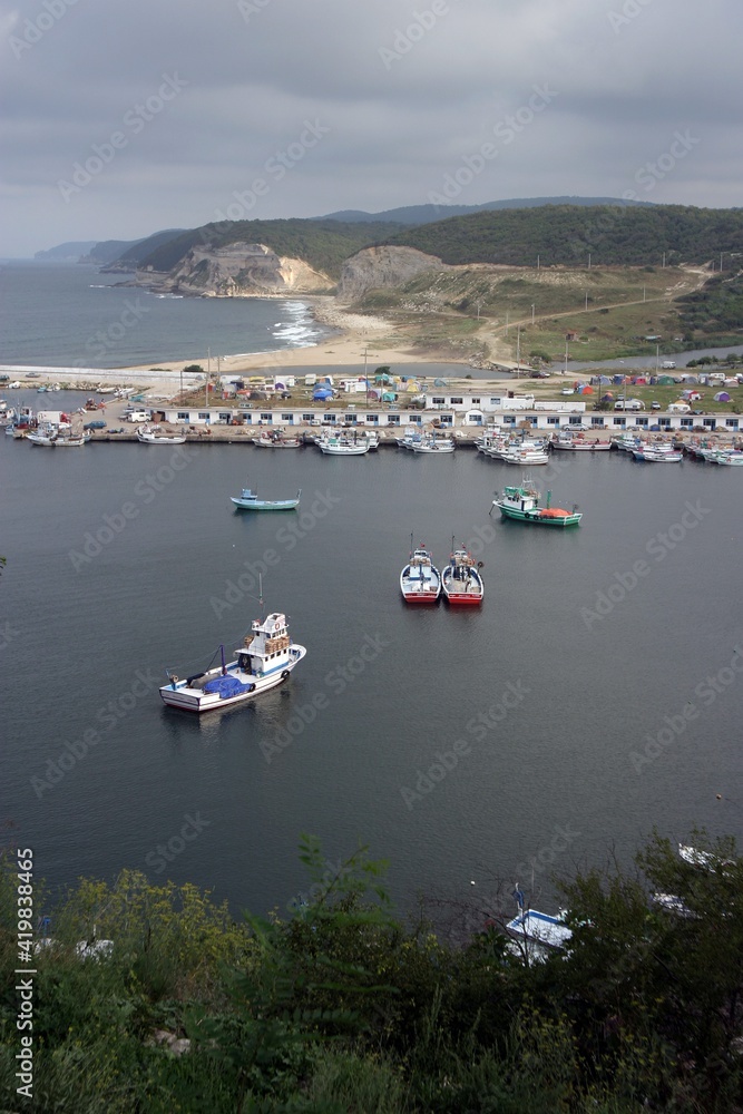 Fishing boats and harbor at beautiful village Kiyikoy in Kirklareli, Turkey.