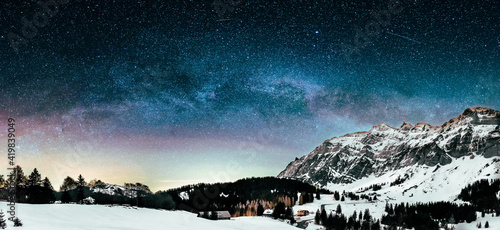 Milky Way in the night over the swiss mountains in Appenzell  photo