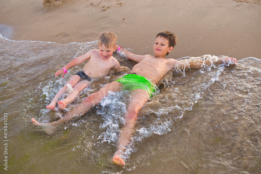 Fototapeta premium boy jumping freedom in the beach 2021 play