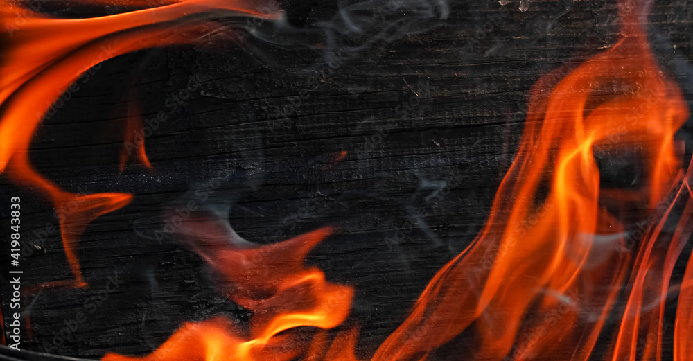 wood background is burning with fire